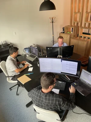 An image of Kim Berthonneau, Jon Pauwels and Jan Andriessens working on a project